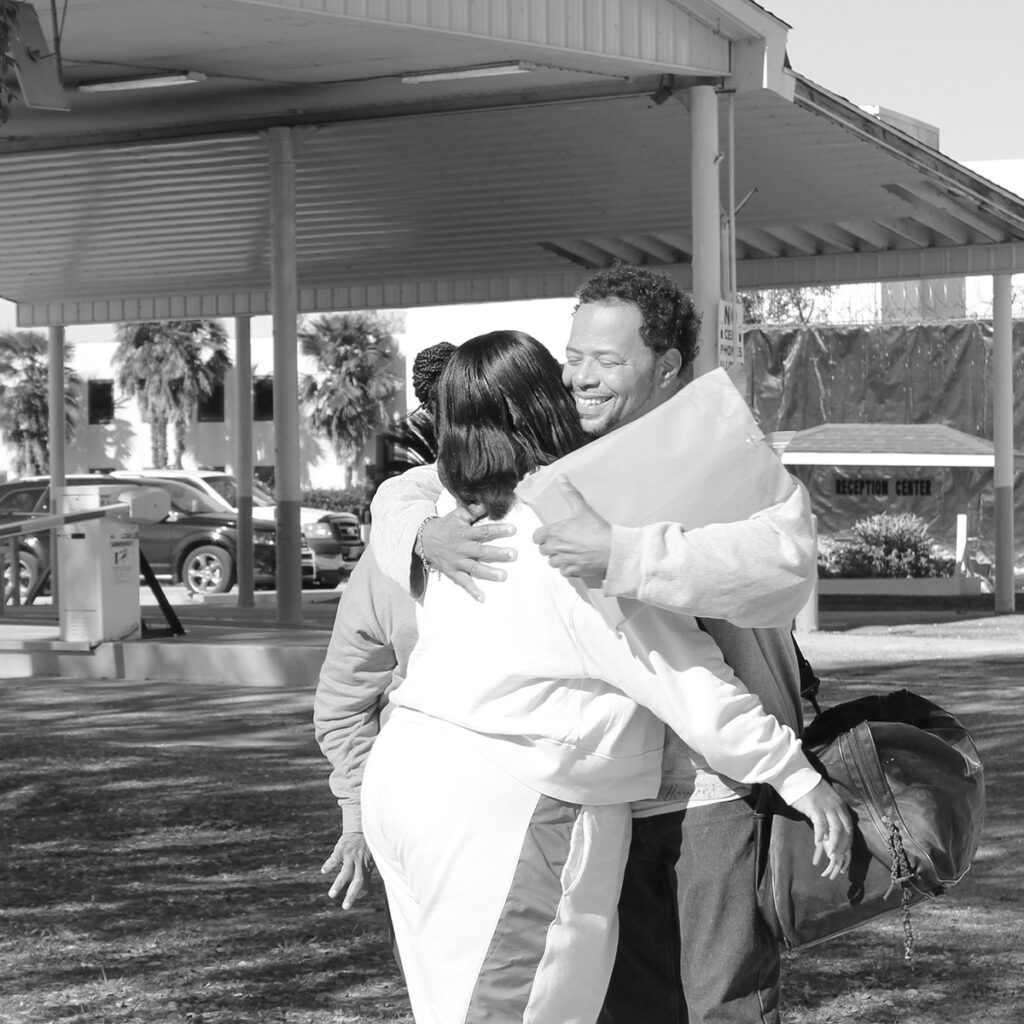 Jim Howard hugging after release