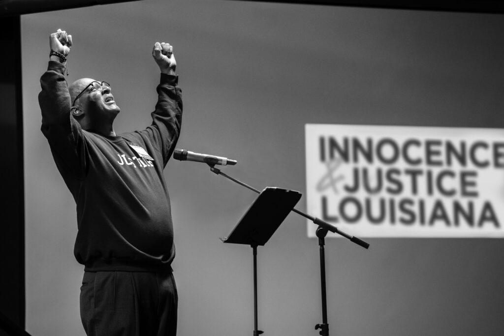 Raymond with his hands up